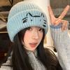 Cute cat embroidery blue knitted women's new sweet and versatile face small warm ear protector wool hat
