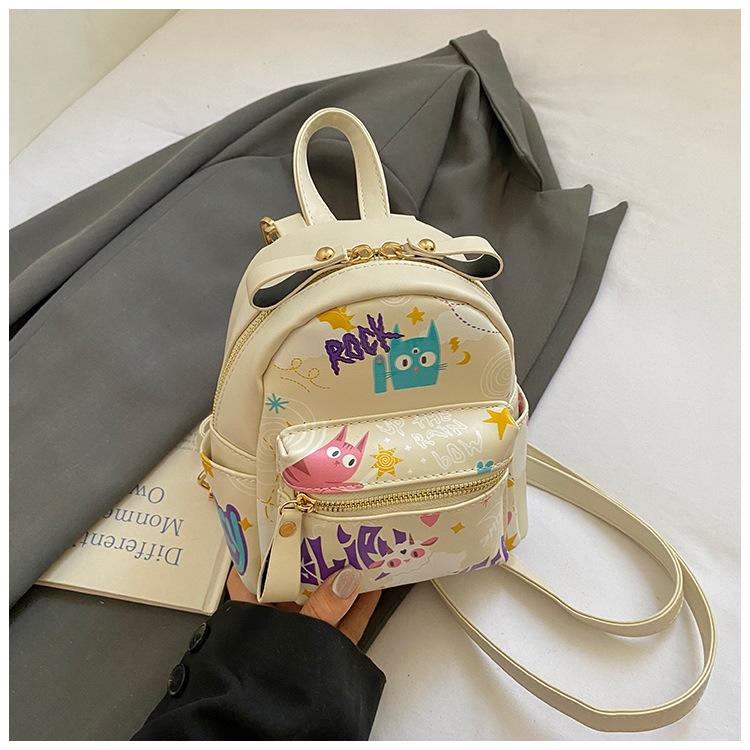 

Niche graffiti small backpack female 2025 new fashion summer cute large capacity Korean version travel schoolbag backpack