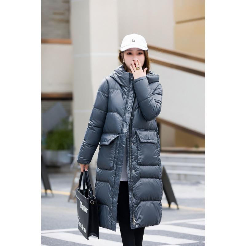 

Cotton clothes, new women s winter fashion, medium and long styles, warm and loose over the knee, bright leather, and big pockets are trendy. M