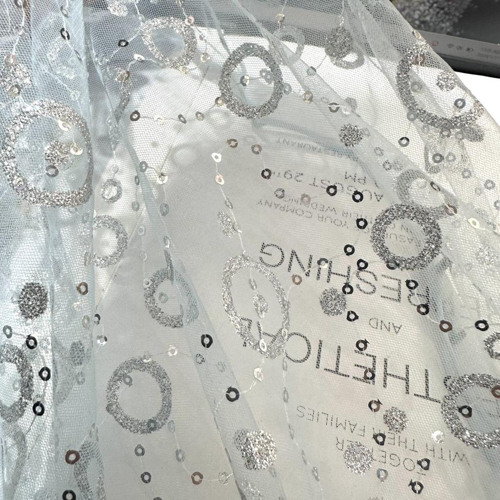 Embroidered sequin round patchwork net fabric suitable for wedding dresses formal gowns and designer clothing fabrics