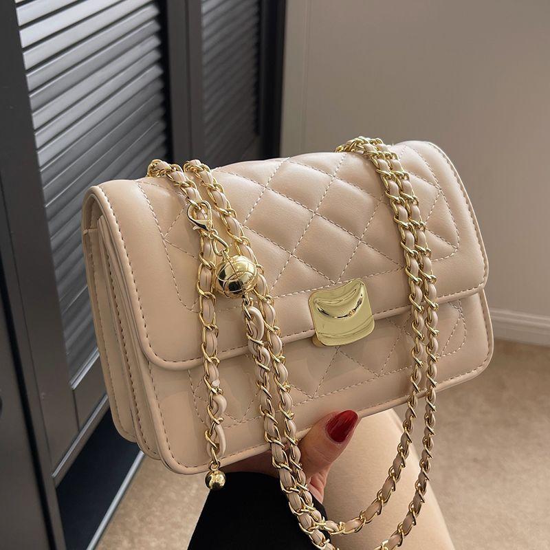 

High-end small bag women s bag new models this year popular Internet celebrity versatile diamond chain bag messenger bag niche бежевый