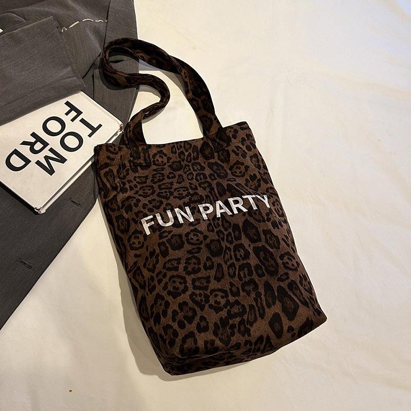 

Autumn new retro plush leopard print shoulder bag casual large-capacity commuter bag tote bag fashion bucket bag women коричневий