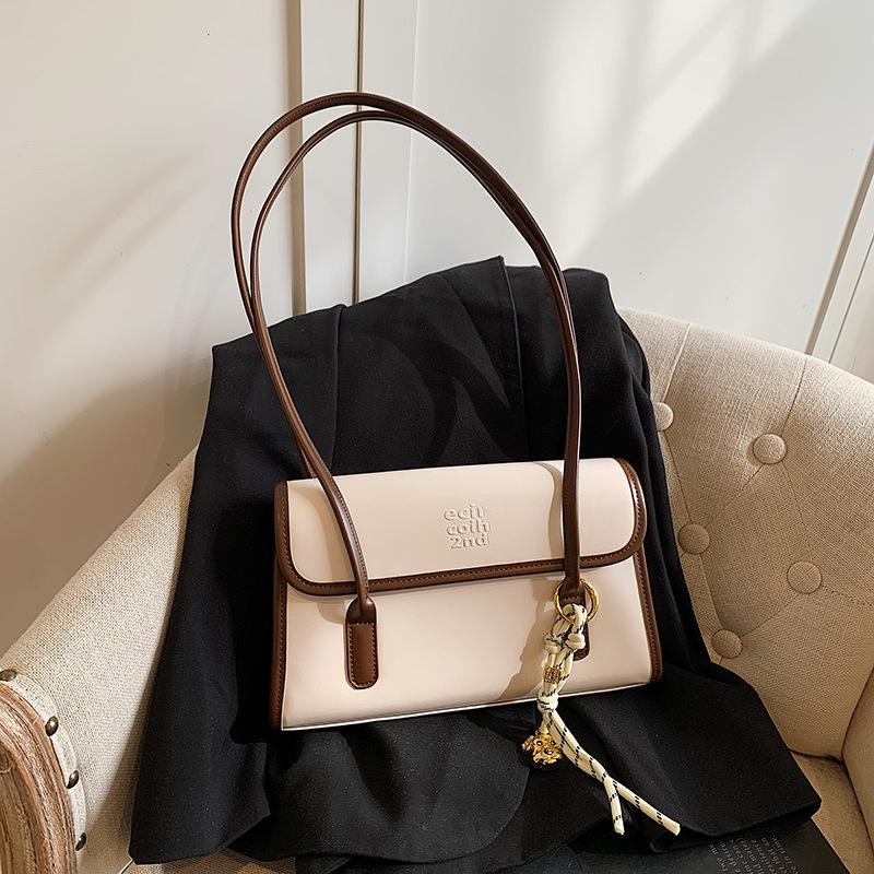 

Нишевая сумка женская 2025 весна и лето новая высококлассная деловая на плечо портативная сумка-багет подмышку 28*5*18