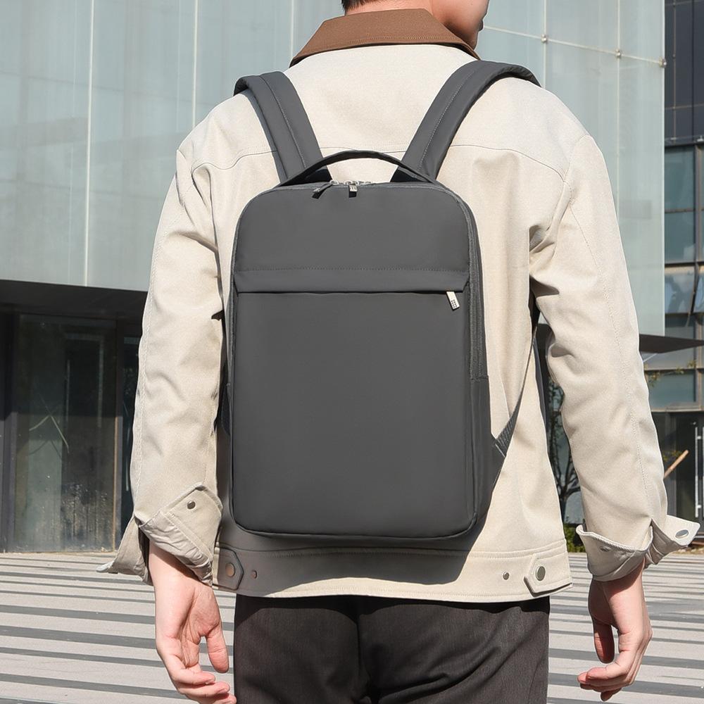 Sleek Minimalist Backpack with Front Zipper Pocket and Padded Shoulder Straps