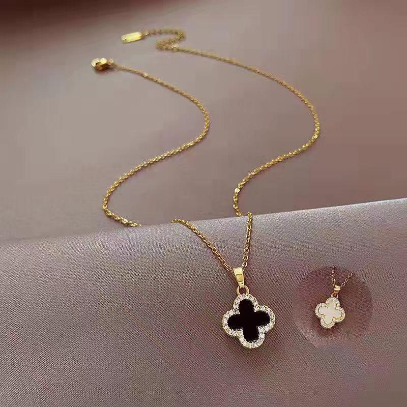 

Модное простое ожерелье с четырьмя листочками клевера, высококлассное ожерелье из титановой стали с подвеской Senior Sense, женское ожерелье black and white