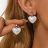 Silver Needle Retro Pearl Heart Earrings: High-End Fashion with European & American Sweet Temperament.