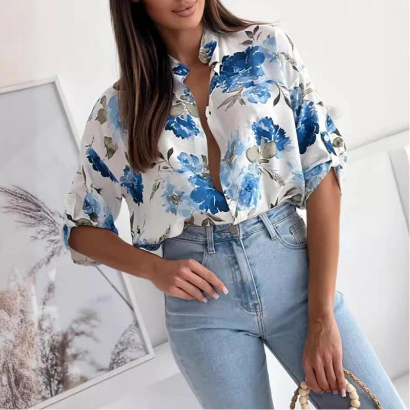 Nueva blusa holgada de manga tres cuartos con estampado y botonadura sencilla para mujer, colección primavera-verano.
