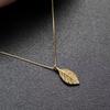 Golden Branch Jade Leaf Necklace for Women: Retro, Light Luxury, Versatile Clavicle Jewelry with Unique Design