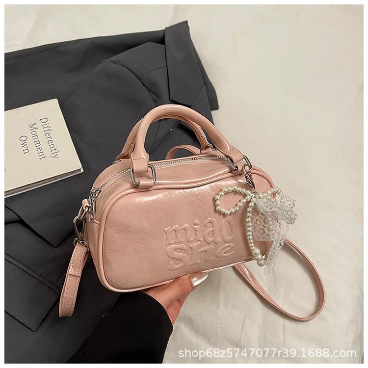 High-end niche bag women's 2025 new PU soft-faced shoulder messenger bag large-capacity trendy portable Boston bag