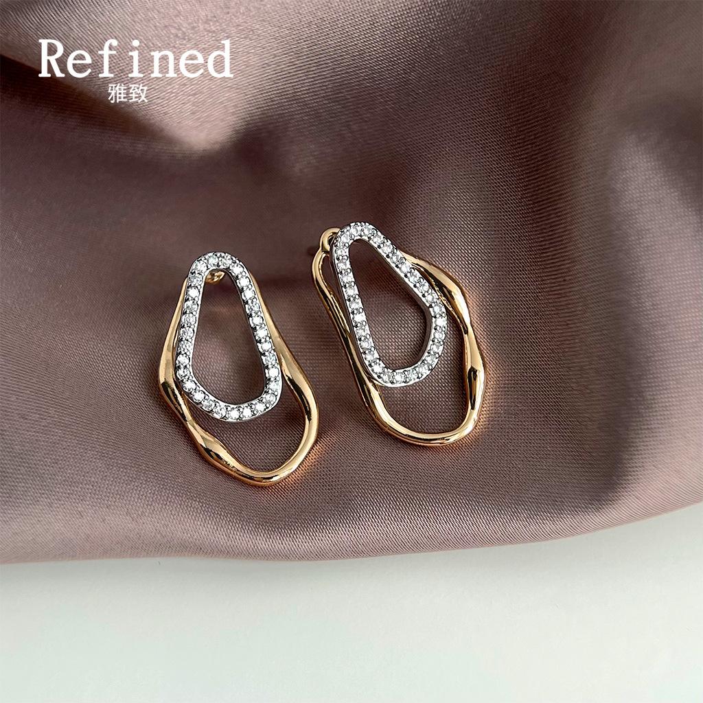 French romantic micro-inlaid zircon geometric two-color earrings light luxury hollow line irregular earrings