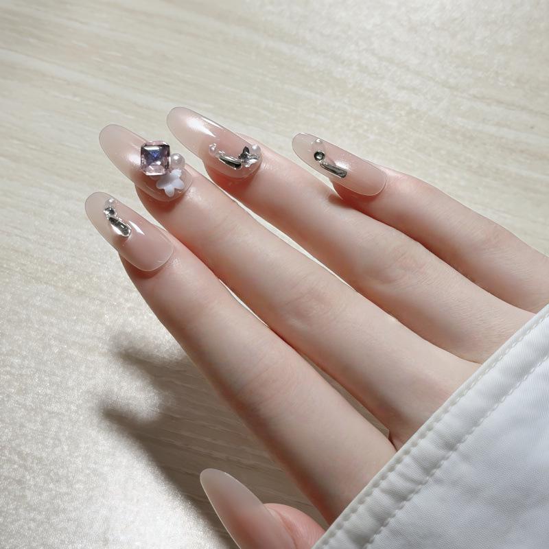 Fairy-Touch Translucent Nude Gradient Press-On Nails with Pink Diamond, Silver Accents, and Small Flowers - Removable & Gentle.