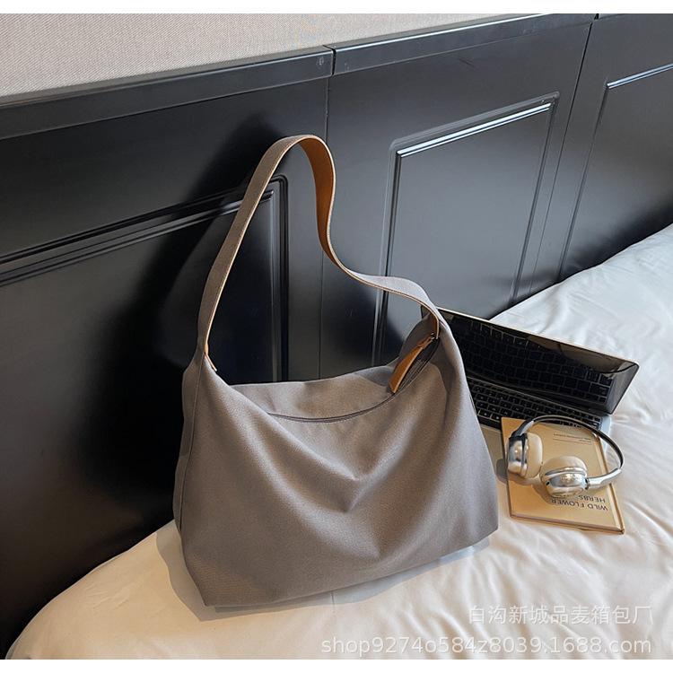 

2025 solid color canvas bag trendy personality daily large capacity simple women s bag shoulder bag messenger bag new women s bag серый