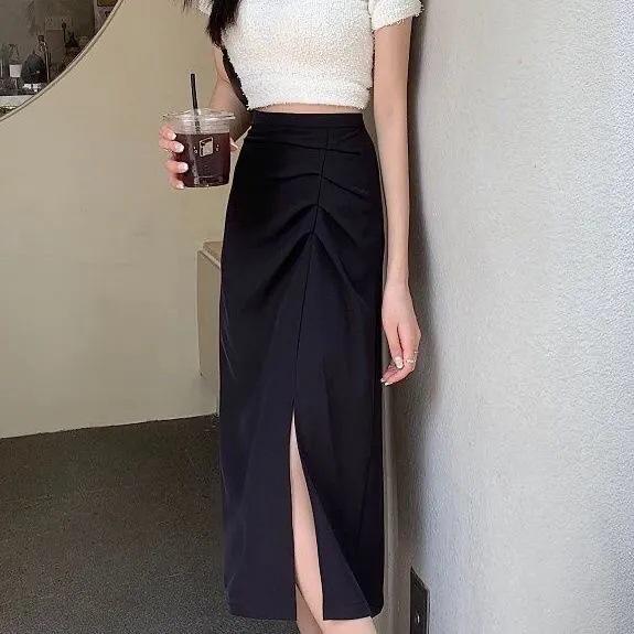 

Женская черная миди-юбка с высокой талией и асимметричным запахом - Летняя мода XS чёрный