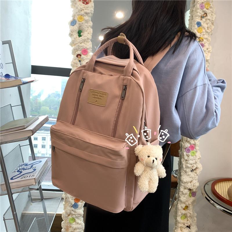 2025 New Portable Small Fresh Literary Canvas Labeled Women's Schoolbag Large Capacity Junior High School Student Backpack