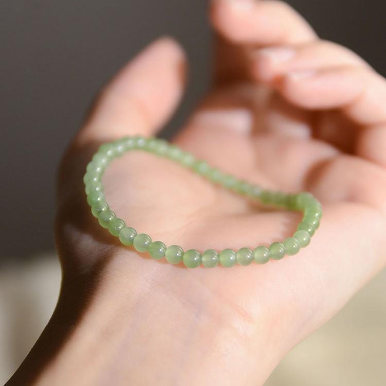 Natural Hetian Jade Bracelet for Women, Ultra-Fine4mm Green jade bead bracelet layered with plain rings in a forest style