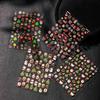 Cyansea 3D Christmas Manicure Stickers: New Year Candy, Tree, and Hat Designs