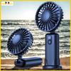 Mini portable portable fan with a handheld usb stand