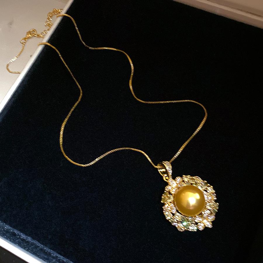 Golden Pearl Light-Gathering Gold-Plated Zircon Jewelry Set: Pearl Ring, Earrings, Necklace – Vintage Light Luxury Collection.