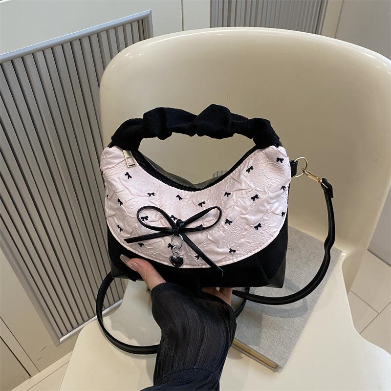 Niche design bow underarm bag women's handbag fashion shoulder messenger bag sweet baguette bag
