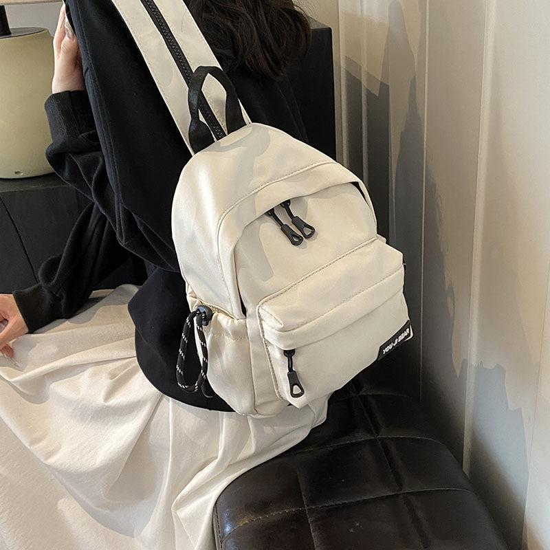 Schoolbag simple and versatile small backpack female niche design ins style schoolbag Korean version single shoulder crossbody student multi-purpose 