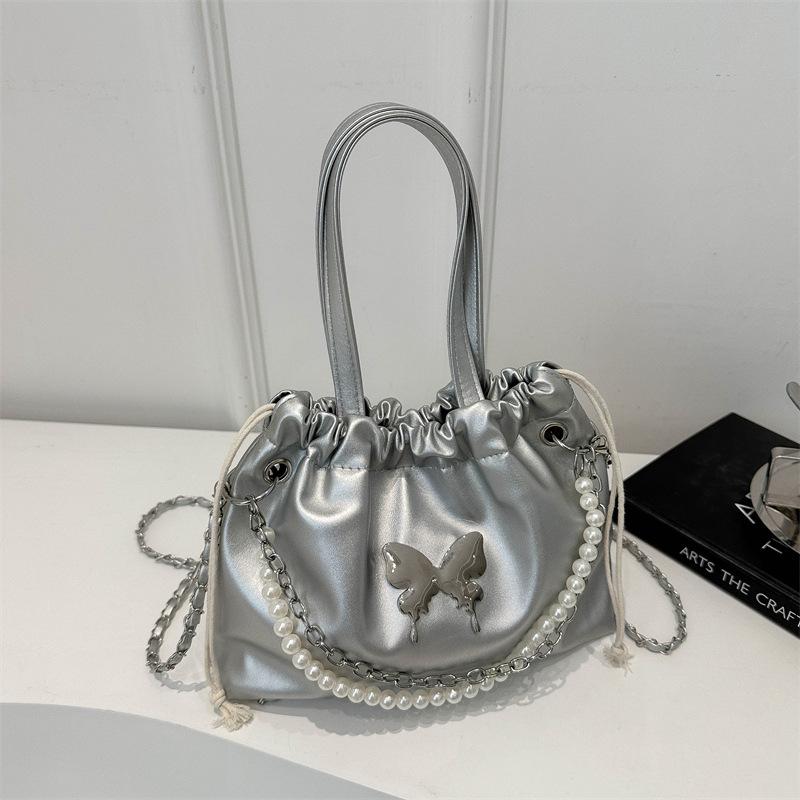 

2024 Korean version bow backpack bag women s spring and summer new fashion pearl chain multi-purpose messenger bag bucket bag срібний