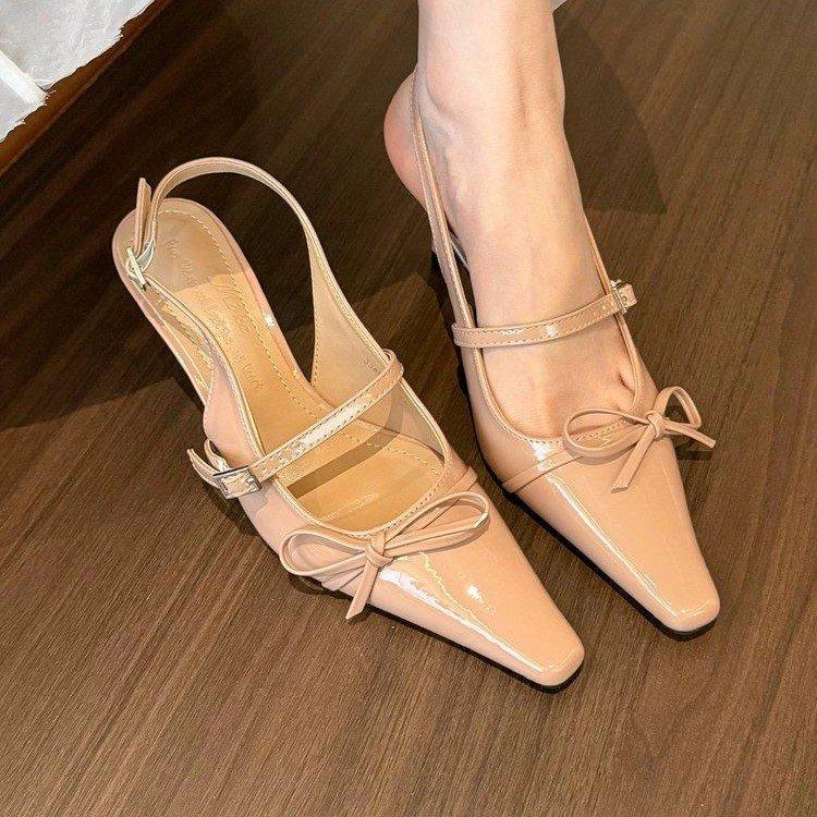 2025 spring and summer new bow medium high heels women's bag head sandals one-word buckle with pointed head empty single shoes women