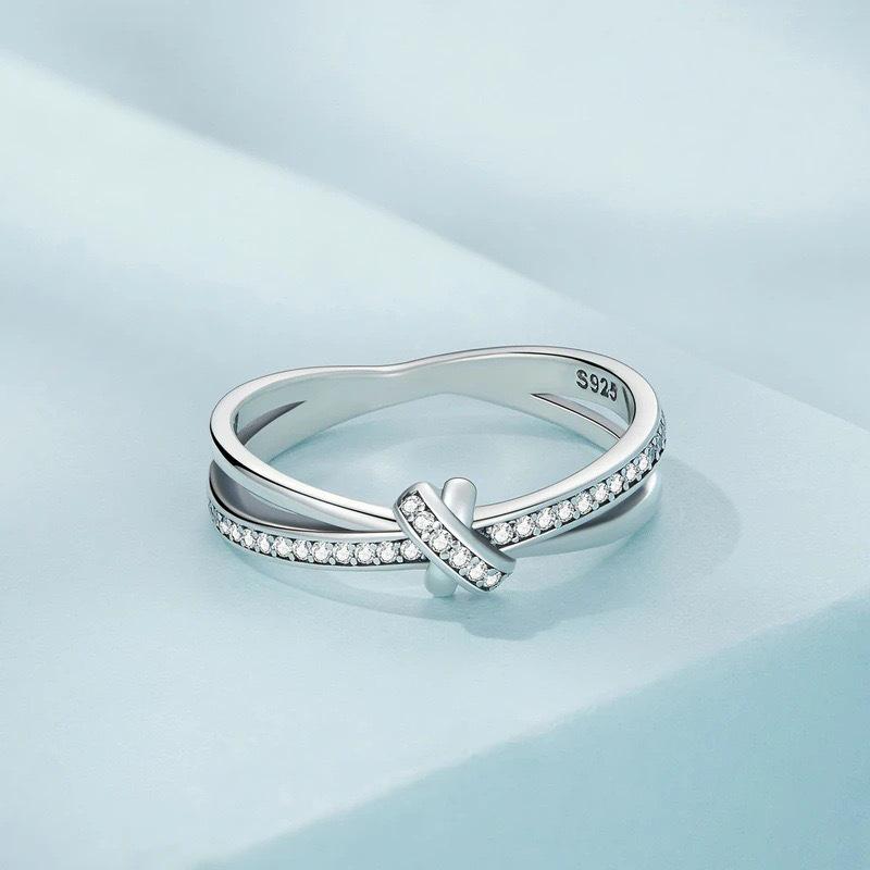 Elegant European & American Style S925 Sterling Silver Knot Ring with Micro-paved Zircon - Simple, High-end Fashion for Women.