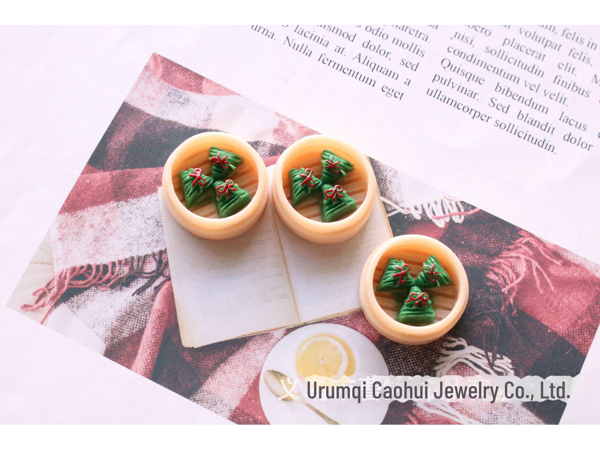 

Мініатюрний брелок з прикрасою з смоли на пару для пельменів