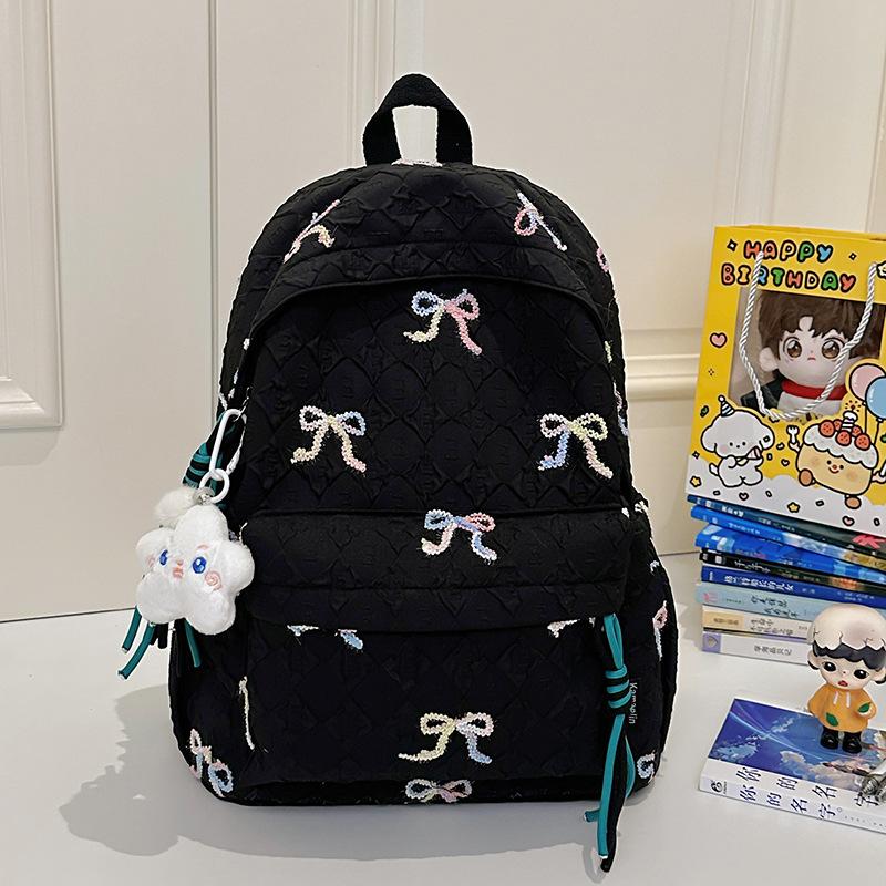 Japanese bow schoolbag for female junior high school students, cute versatile large-capacity backpack, high-value student backpack tide