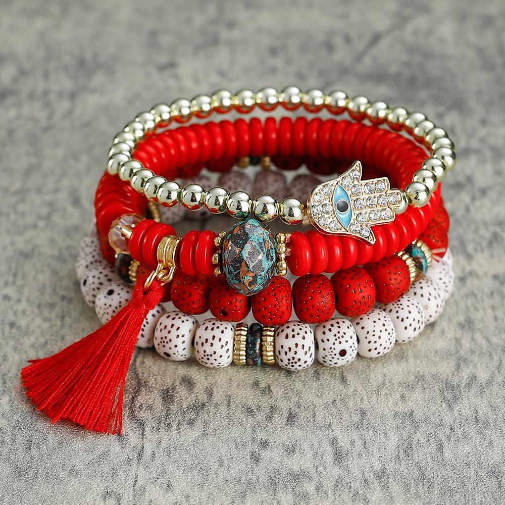 Bracelet bohème multicouches en perles avec pompon et motif palmier contre le mauvais œil pour homme et femme
