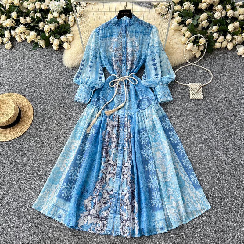 

Праздничный стиль Элегантный дизайн Воротник-стойка Однобортный Облегающий талию Рукав-фонарик Принт Плиссировка Большой подол Длинное платье Женщины Blue S