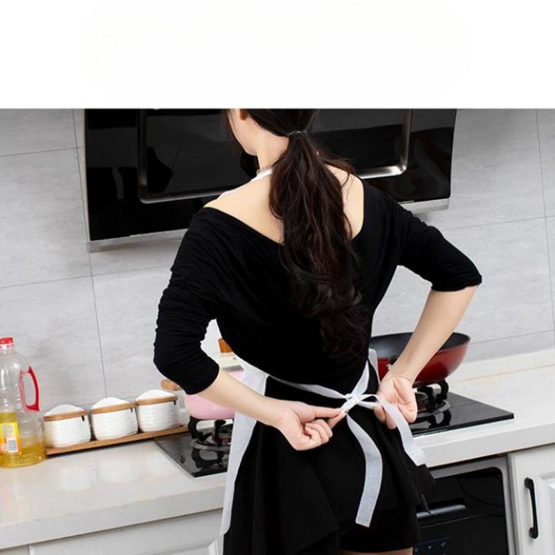 

Disposable Non-woven Fabric Apron, Breathable and Thickened Heart-shaped Apron, Family Dining, Barbecue and Catering Apron Strap style -10 pieces