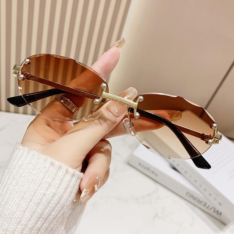Rimless Punk Vintage Oval Sunglasses Women For Men Luxury Brand Designer Sun Glasses Popular Metal Rivet Hip Hop Shades Uv400