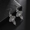 European and American Fashion Temperament Light Luxury Hollow Lotus Ear Hook Retro Women Stainless Steel