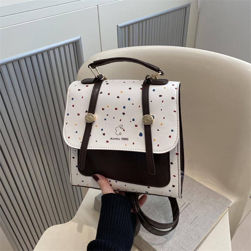 

Текстурный большой вместимости колледжский стиль кэжуал 2025 новая мода ретро простой зарубежный стиль в горошек простой рюкзак женский белый