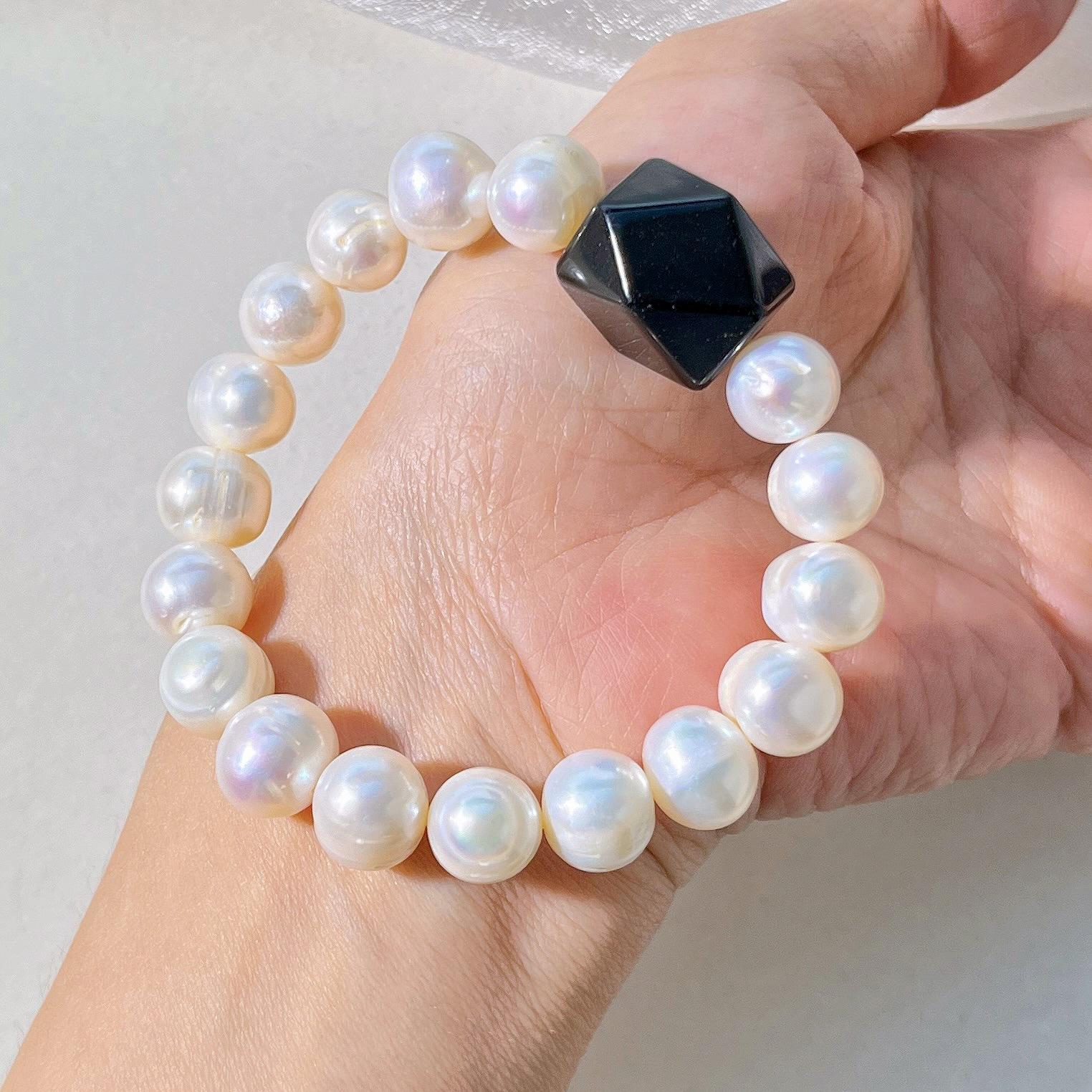 Autumn And Winter New Natural Obsidian Freshwater Pearl Bracelet Bracelet.
