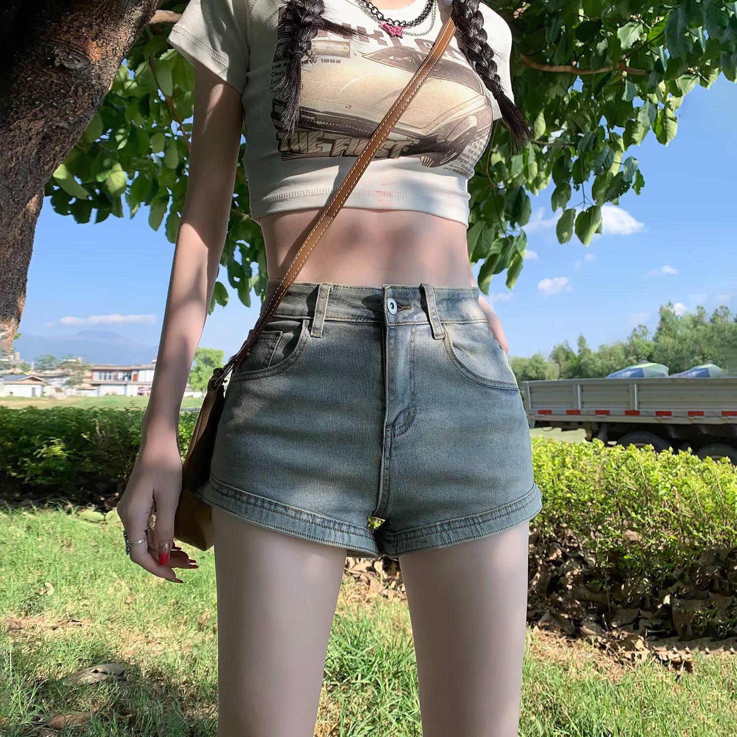 

2026 New Style American Spicy Girl Xintang Women s Denim Shorts: Slimming A-line Super Short Hot Pants for Summer S