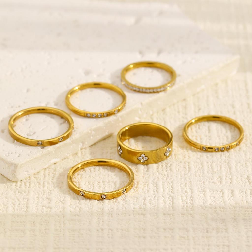 Gold-Plated Diamond-Inlaid Stainless Steel Cross Ring Set: Three-Piece Light Luxury Design with Single Row Stackable Flower Rings.
