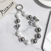 Y2K Silver Bow Beaded Phone Case Lanyard Stylish Bead Phone Chain Wrist Band Anti Lost Phone Strap Earphone Pendant Keychain