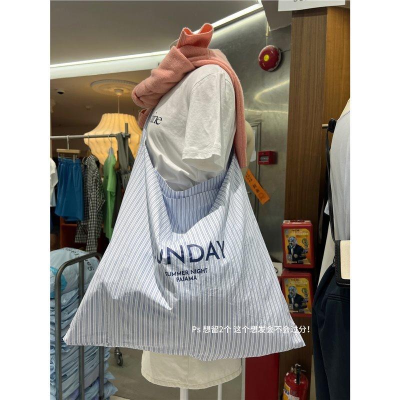

New letter printed striped cloth bag large capacity simple shoulder bag tide Standard