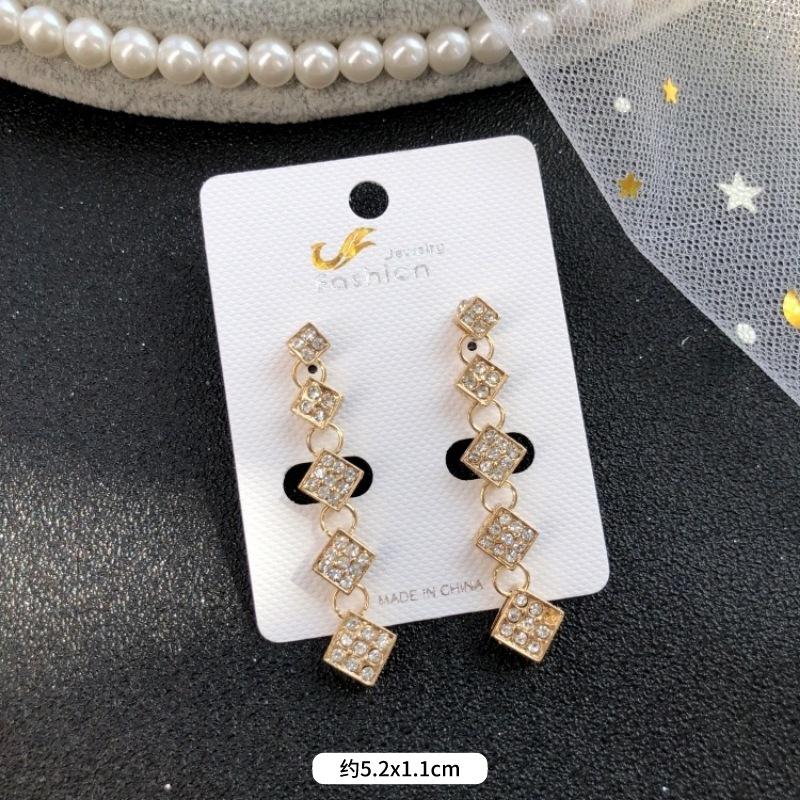 Retro temperament celebrytki kryształowe kolczyki sztyfty z diamentami, damskie luksusowe super błyszczące kolczyki z frędzlami na przyjęcie, proste kolczyki z kamieniami szlachetnymi