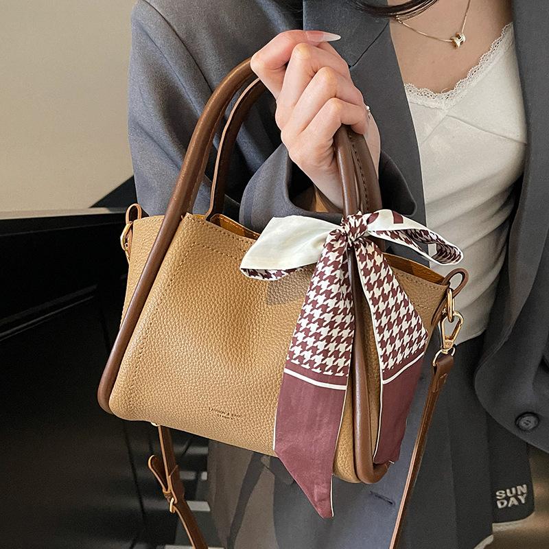 Popular hot-selling simple temperament Korean casual portable vegetable basket bag high-end lychee pattern crossbody child and mother bag female