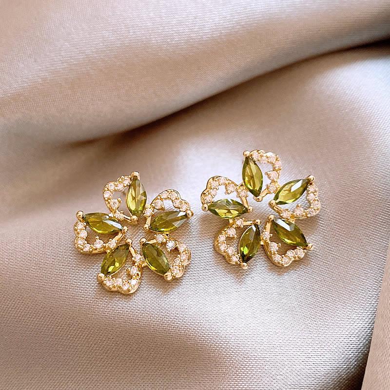 

Европейские и американские серьги-пусеты с геометрическим дизайном в виде цветка из зеленого циркона – Роскошный, универсальный дизайн