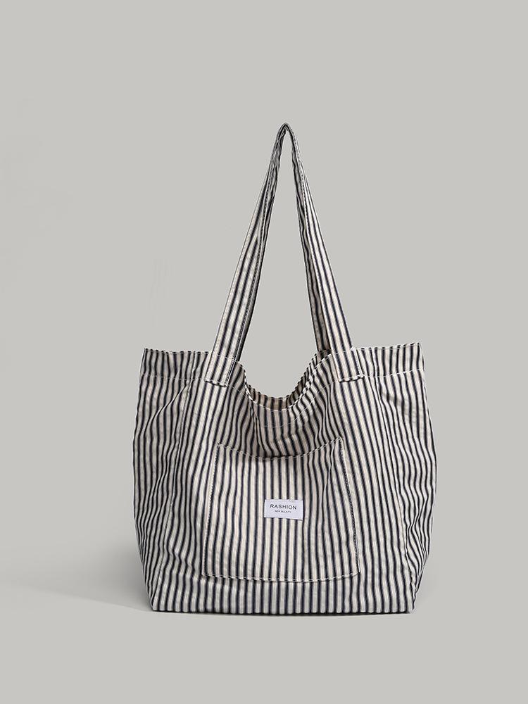 

Japanese simple striped canvas bag female lazy wind large capacity class commuter bag fashionable shoulder handbag tide