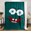 Bright cartoon face with large blue eyes, wide smile, and prominent teeth. for all seasons blanket lunch break throw gift