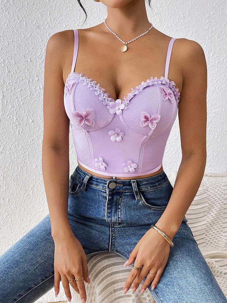 Gorsetowy top z haftem motyla i fiszbinami