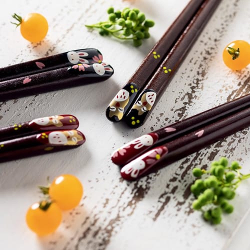 These Traditional, High-quality Chopsticks Are Meticulously Crafted by Japanese Artisans. They Are 23cm Long, Black, Pointed, and Made of Natural Wood