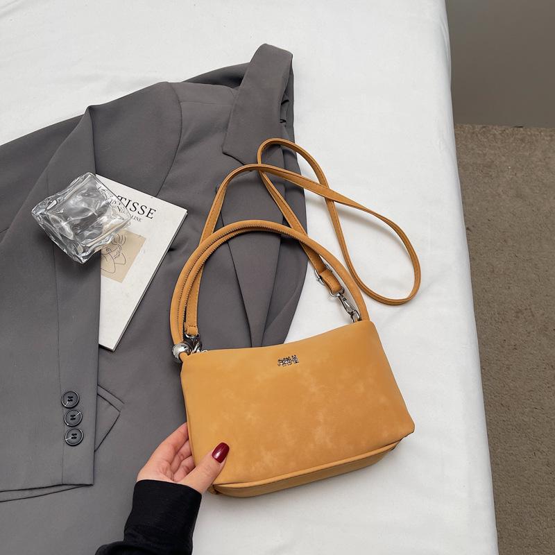 Hand bag women's 2025 new trendy light luxury niche high-end shoulder bag popular retro messenger bucket bag