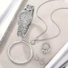 Full Diamond Roman Literary Steel Belt Watch Female Gypsy Temperament Business Quartz Watch Hip Hop Wind Full Diamond Bracelet Set