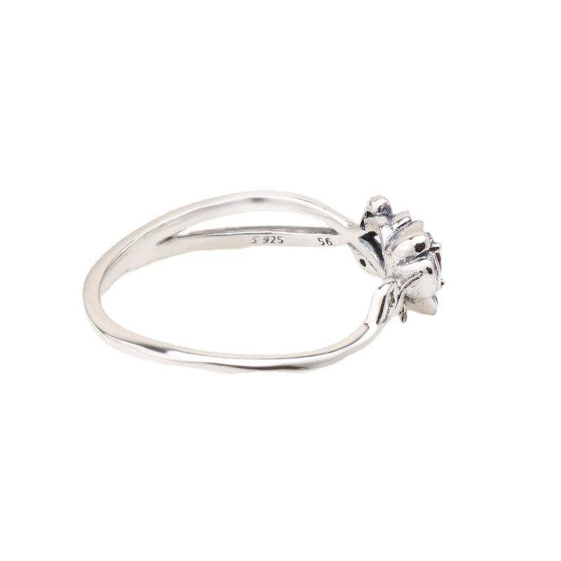 Pan Jia Silver-Plated 'Beauty and the Beast' Rose Ring: European & American Fashion Floral Petal Ring for Women.